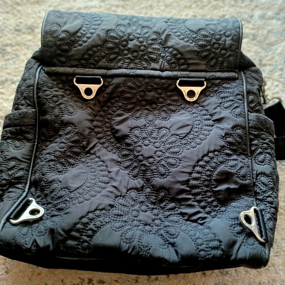 Petunia Pickle Bottom Embossed Black Diaper Bag